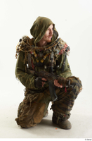 Photos John Hopkins Army Postapocalyptic Suit Poses kneeling whole body 0001.jpg
